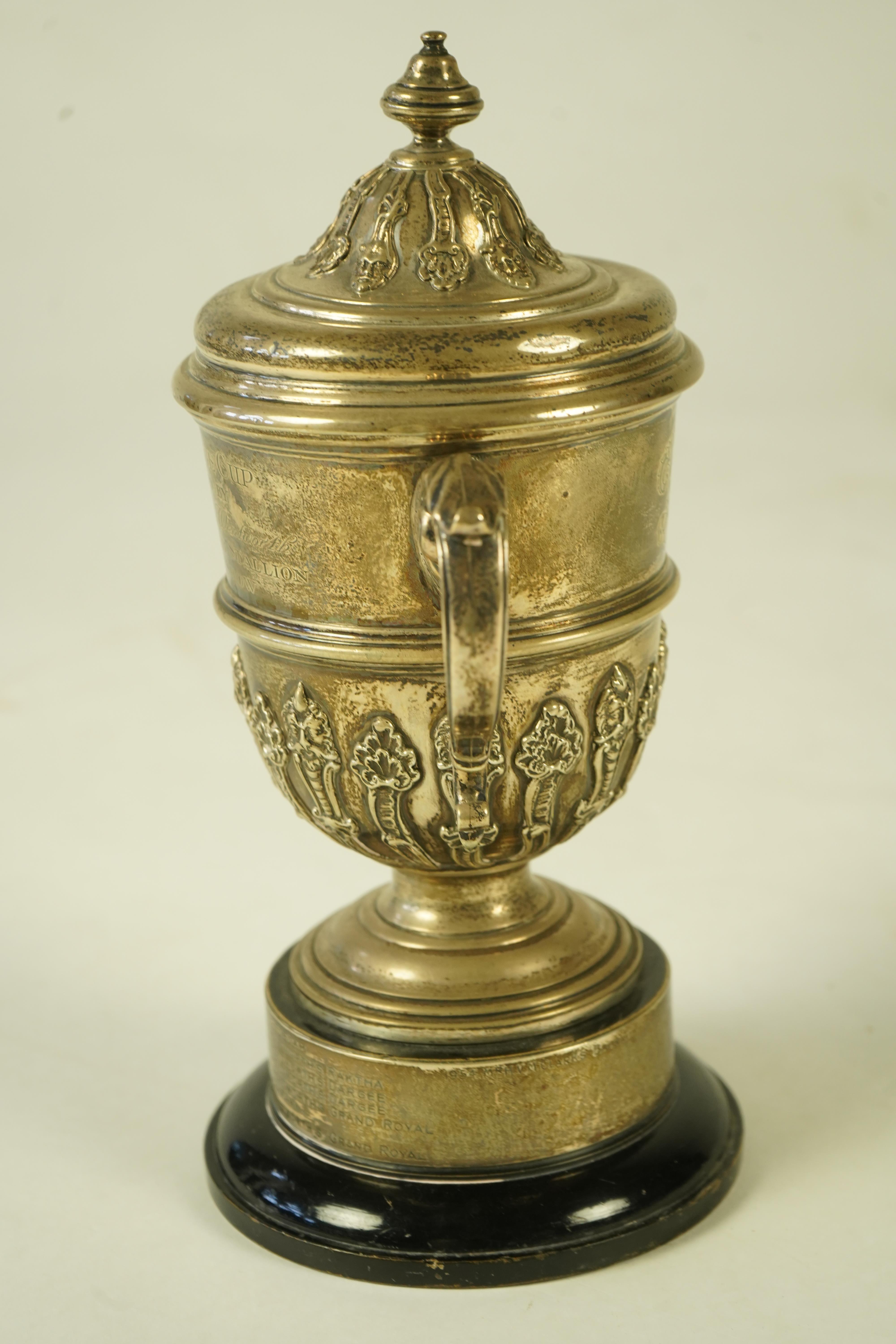 A George V silver two handled presentation cup and cover, by Charles & Richard Comyns, with engraved horse racing inscription relating to 'The Arab Horse Society Challenge Cup Presented by The Rt. Hon. Lady Wentworth for